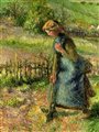 a woman digging in a garden