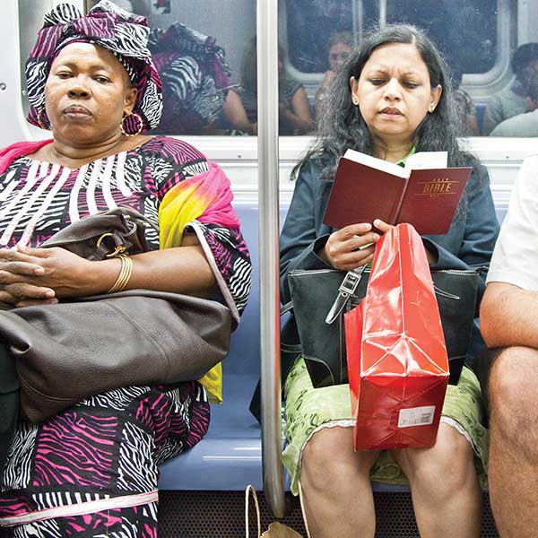 two women riding the subway