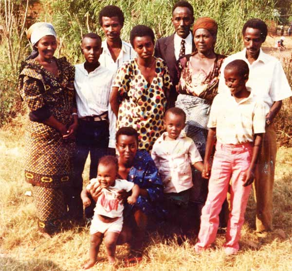 Denise, (left) and Charles, (back row third from left) visiting Denise’s parents in the Congo in August 1993.