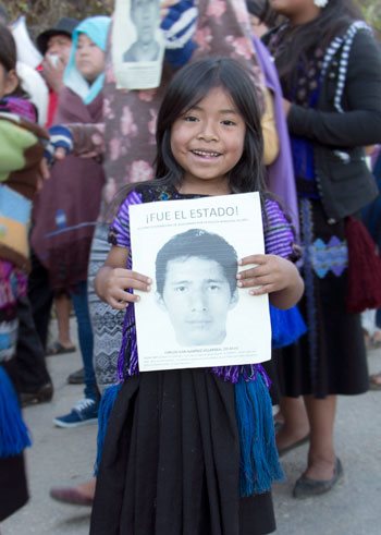  A child from Acteal marches in support of the forty-three Mexican students kidnapped from Ayotzinapa, Mexico (2014).