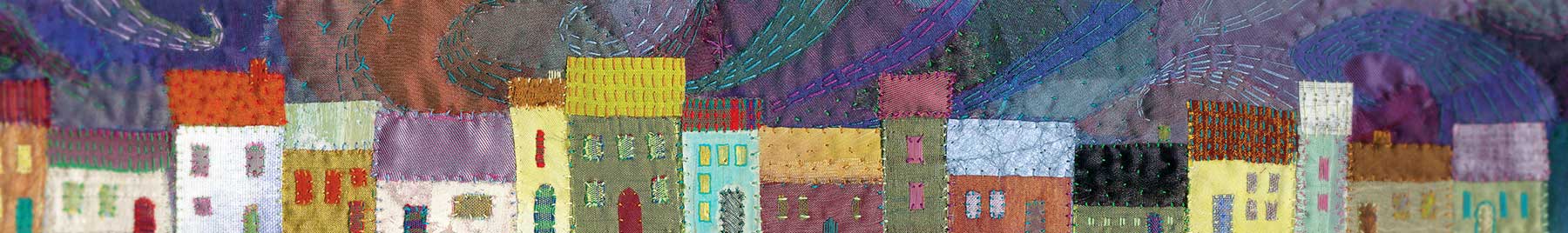 Embroidered textile image of a street