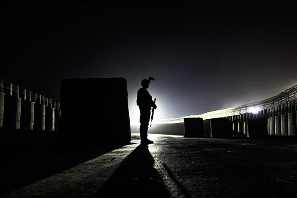 soldier on guard in the night