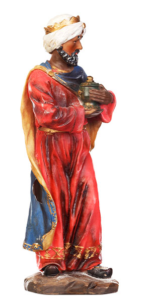 painted carving of a king standing with a gift in his hands