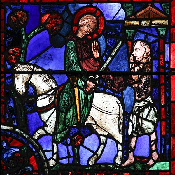 stained glass window depicting Saint Martin of Tours on horseback