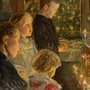 children looking at a crib scene