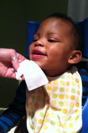 Matthew, a boy with profound disabilities, smiling and responding to love.