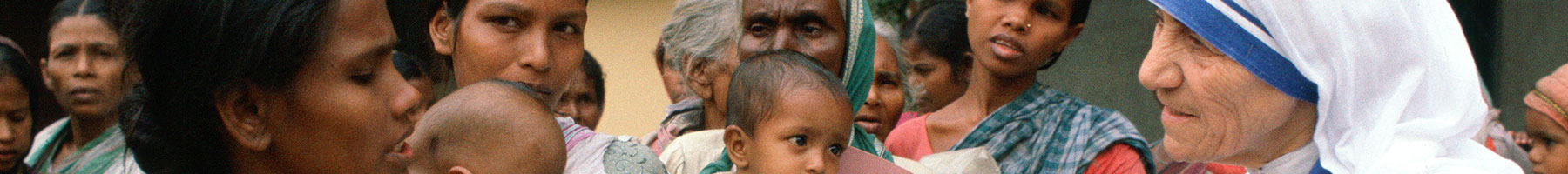 Mother Teresa with mothers and children at her Mission in Calcutta India