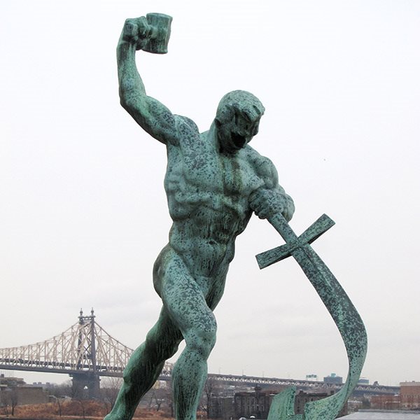 statue of a man beating a sword into a plow, United Nations