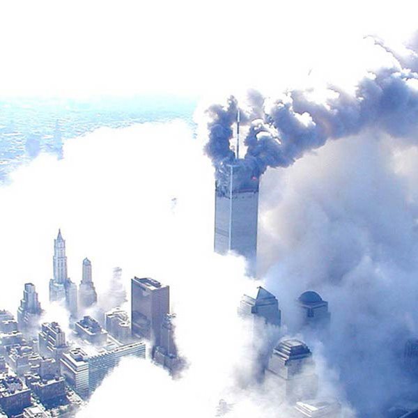 the World Trade Center surrounded by smoke on September 11, 2001