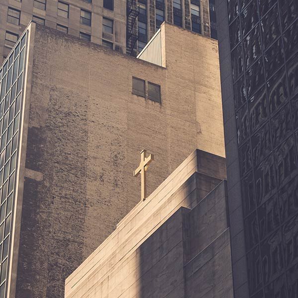 cross on top of a city church