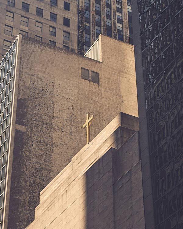 cross on top of a city church