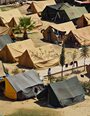 Tent of Christian Syrian refugees with cross painted on the roof