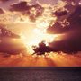 orange and gold sunset over the ocean