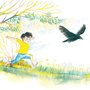 a little boy running through the grass