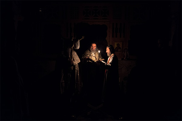 Easter Vigil, 4 a.m. The first text is read in the dark before mass is celebrated.
