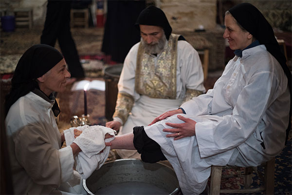 Holy Thursday: Sisters Freidericke and Carol participate in the Washing of the Feet.