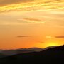 golden sunrise over hills