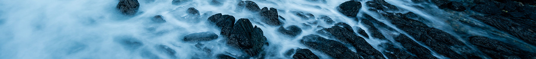 waves crashing on rocks