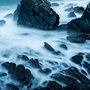 waves crashing on rocks