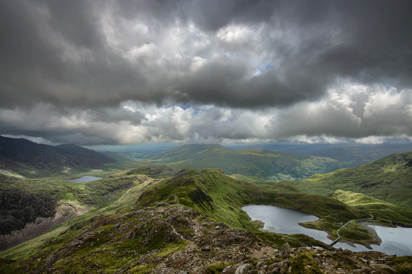 clouds over a mountainous landscape