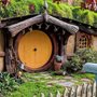 a Hobbit Home with a round yellow door