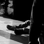 a homeless man on a sidewalk