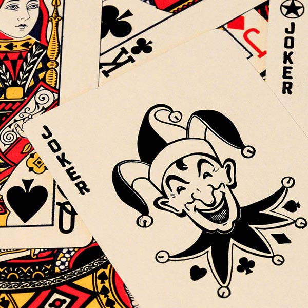 Playing cards thrown in a pile