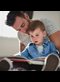 dad reading a book with his toddler