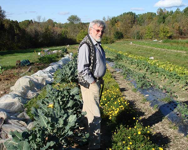 Tom Cornell on the main field of the Peter Maurin Farm