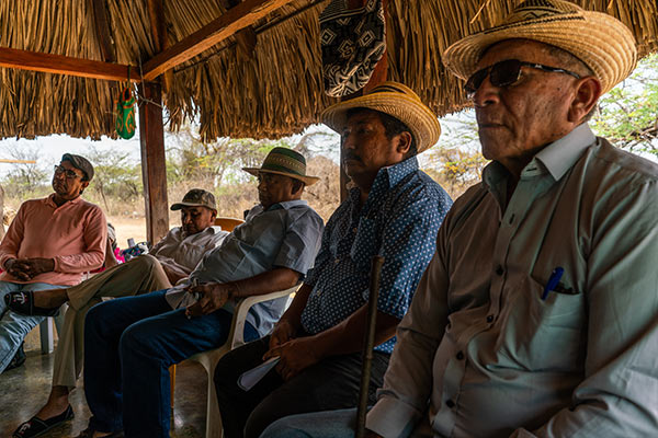 Wayuu leaders and others meet to discuss the conflict between indigenous groups and proponents of the wind farms