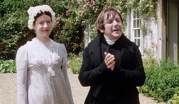 still from the 1995 BBC series of Pride and Prejudice showing Mr Collins rubbing his hands together