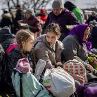 Ukrainian refugees waiting for trains at the Lviv Railway Station