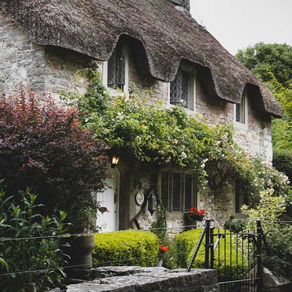 thatched cottage in an English garden