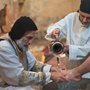 man washing a persons feet