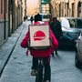 a food delivery man on a bicycle