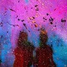abstract photo of a couple in a swirl of blue and pink