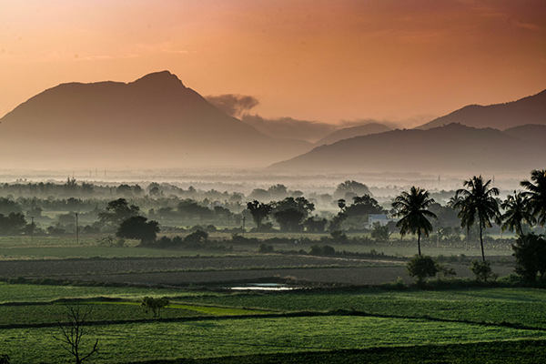 sunrise over valley in India
