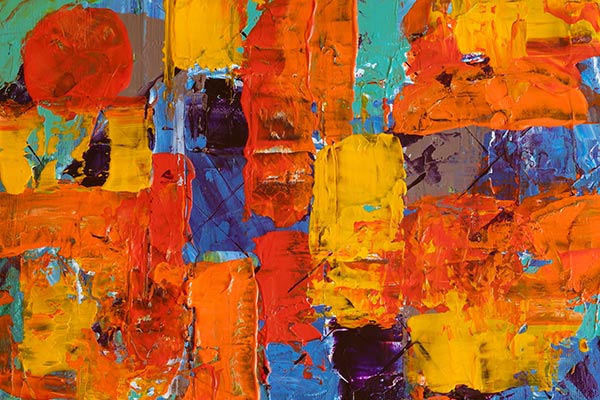 Pintura abstracta en naraja, amarillo, verde y azul
