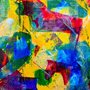 Abstract painting in  yellow, red, blue and green tones.