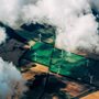 aerial view of windmills in farmland