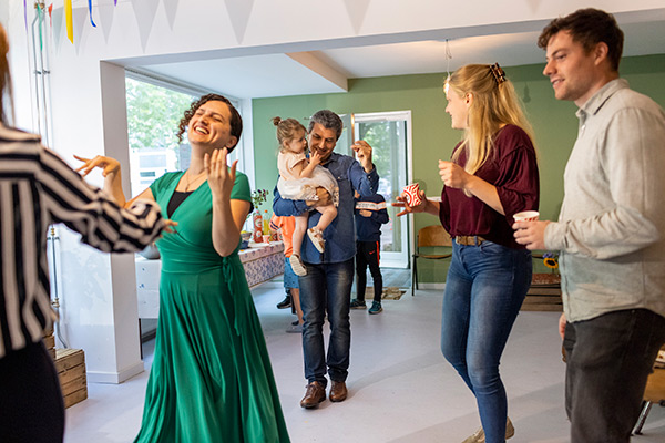 happy people dancing together