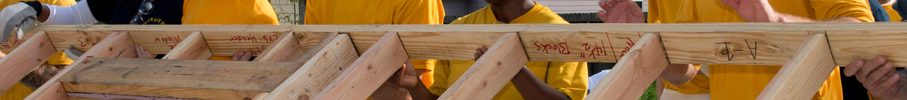volunteers building a house