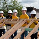 volunteers building a house
