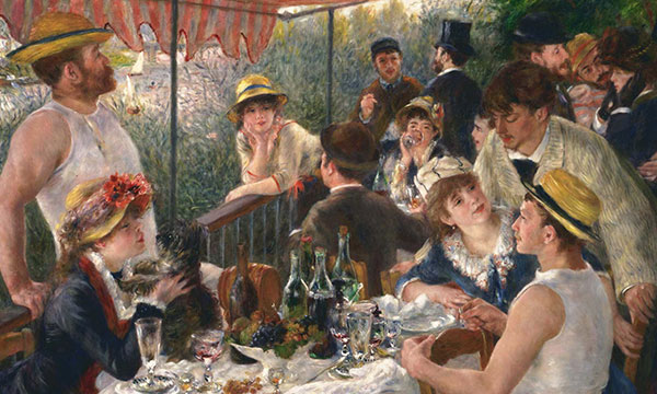 People sipping wine at an outdoor summer party