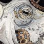 watercolor painting of an octopus entangled in rusty gears