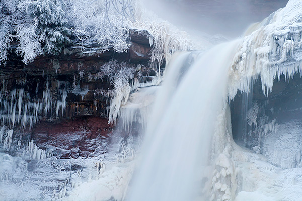frozen waterfall in winter