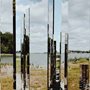 mirrors sculpture by a river