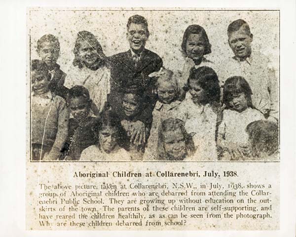newspaper clipping showing a group of smiling children