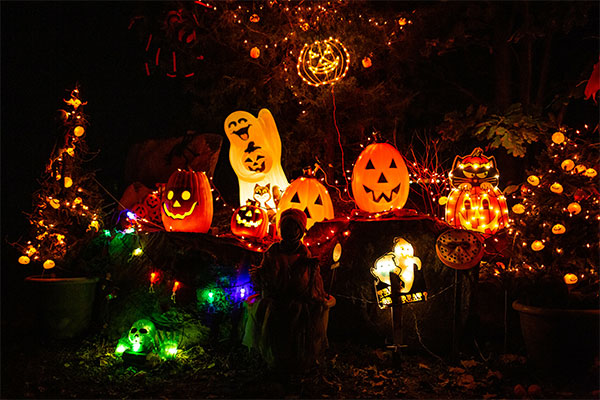 brightly lit Halloween decorations in the dark