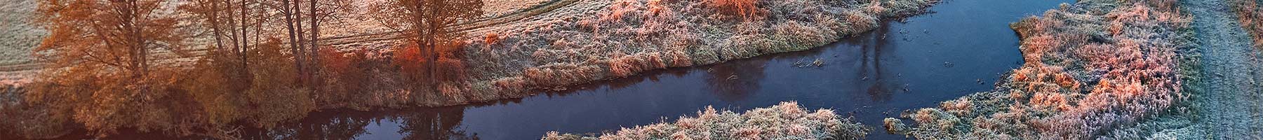 aerial view of farmland on a frosty morning